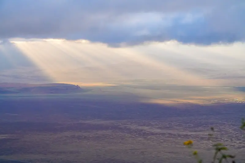 Sunlight breaking over the Ngorongoro Crater floor